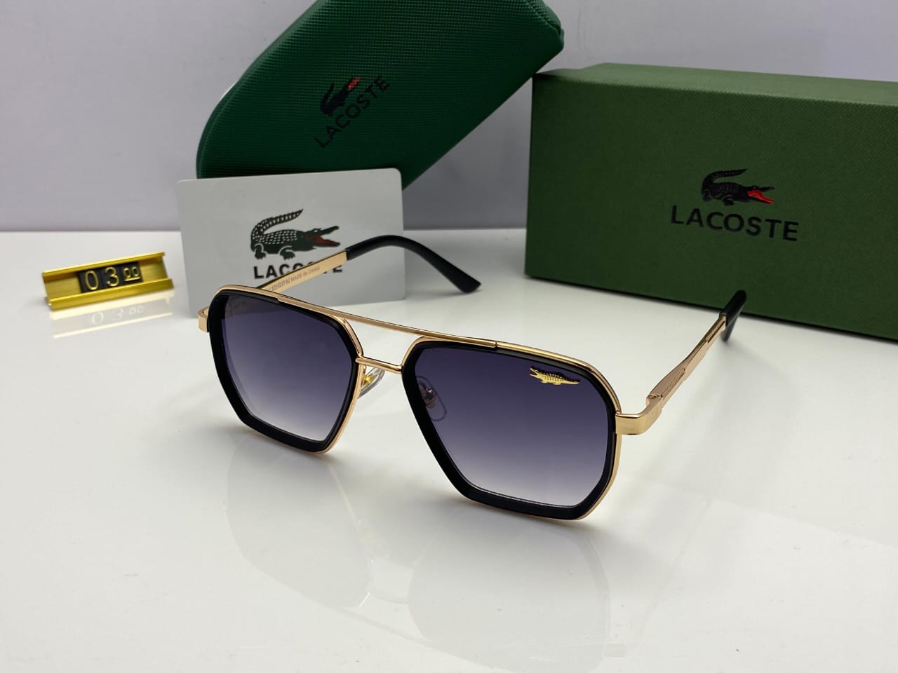 Lacoste Hex Sunglasses Gold Frame | Gradient Black Lenses | Signature Emblem