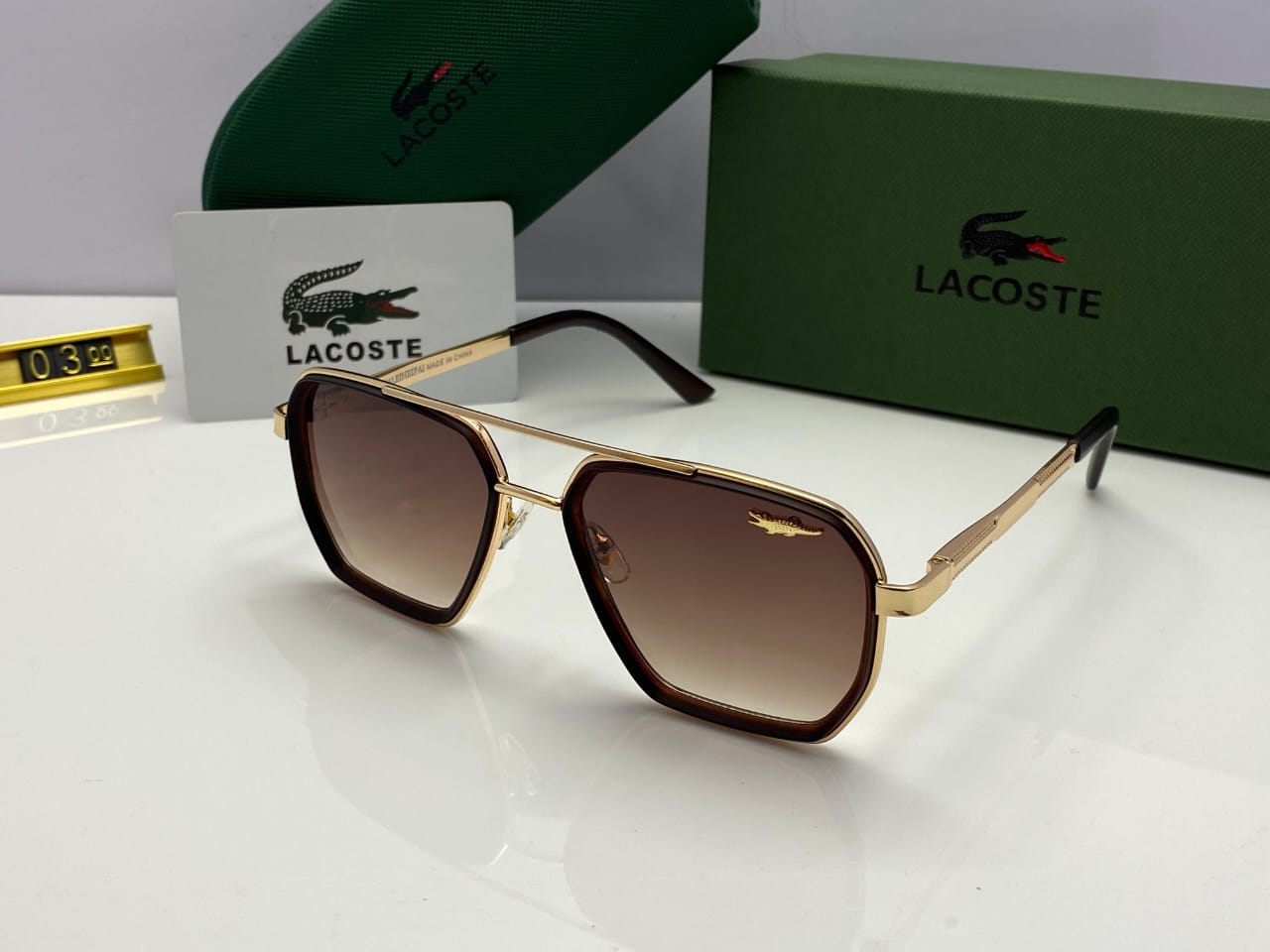 Lacoste Hex Sunglasses Gold Frame | Gradient Brown Lenses | Emblem Accent
