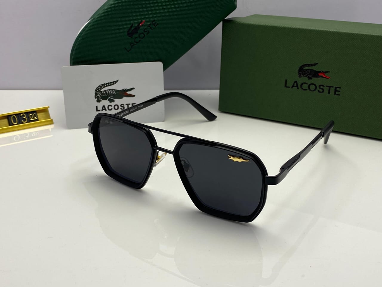 Lacoste Hex Sunglasses Black Frame | Black Lenses | Signature Emblem