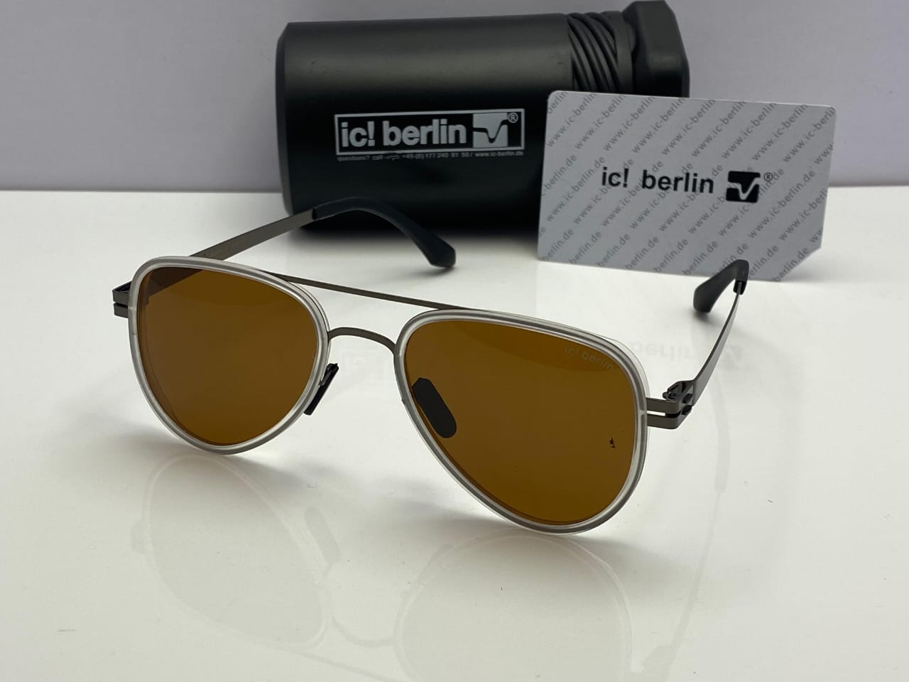 ic! berlin Oval Sunglasses Matte Black Frame | Gradient Brown Lenses