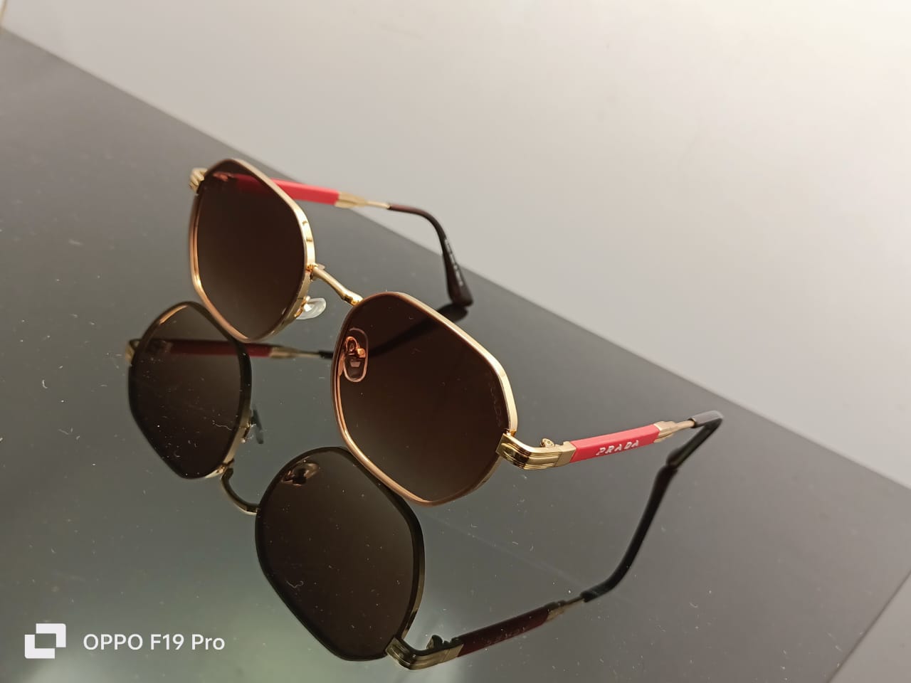 Prada Luxe Iconic Sunglasses Gold Frame | Gradient Brown Lenses | Red Temple Arms