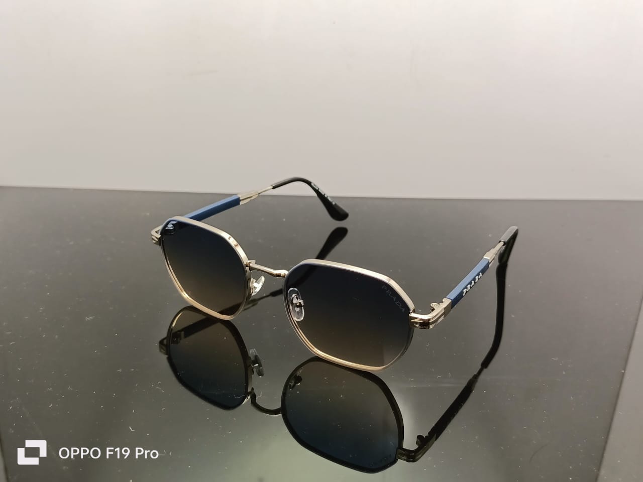 Prada Luxe Iconic Sunglasses – Silver Frame | Gradient Black Lenses | Blue Temple Arms