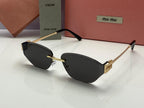 Miu Miu Luxe Fade Shield Sunglasses Gradient Black Lenses | Golden Frame
