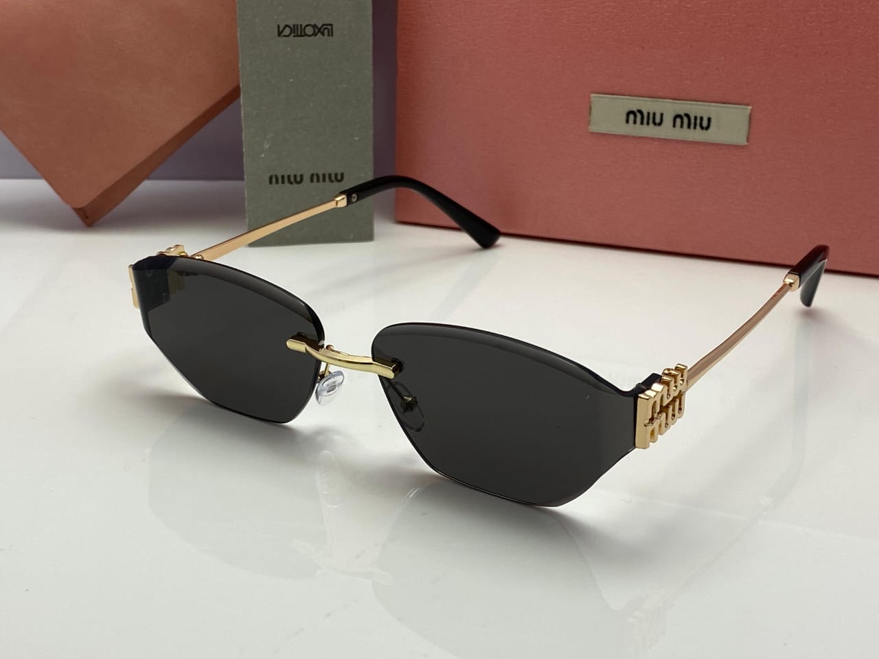 Miu Miu Luxe Fade Shield Sunglasses Gradient Black Lenses | Golden Frame